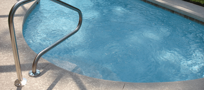 A swimming pool with cloudy pool water