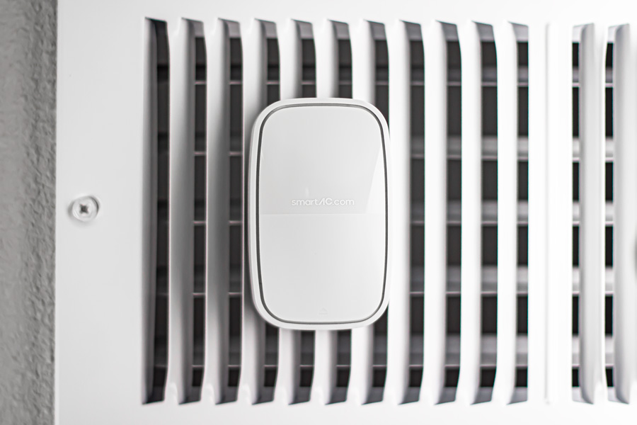 A SmartAC sensor against an AC vent