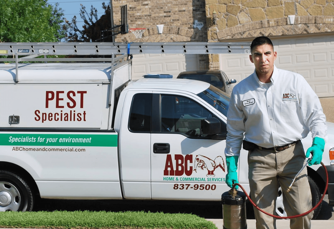 an ABC pest control specialist arriving at a home for treatment