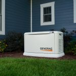 A standby generator outside of a house