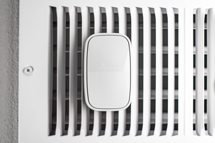 A SmartAC sensor attached to an AC vent