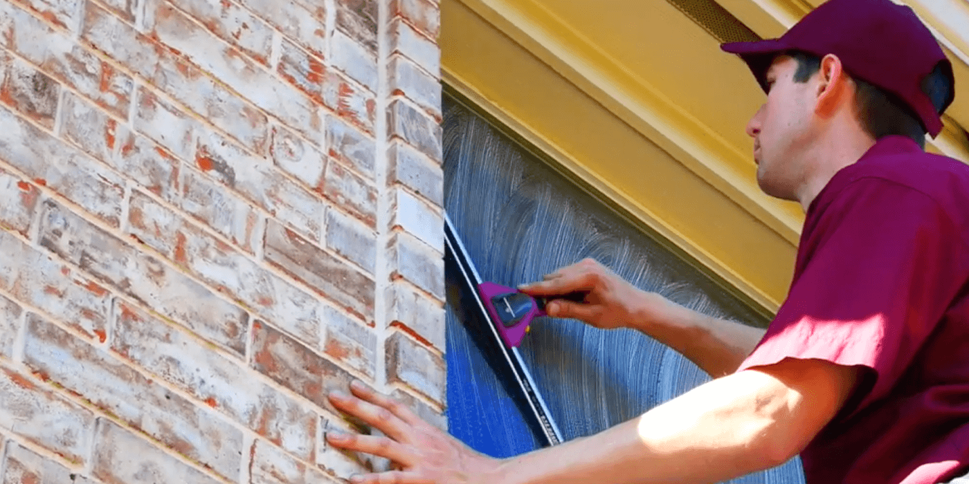 specialist providing window cleaning services