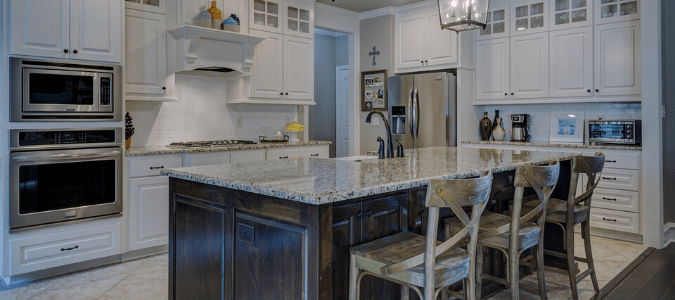 white kitchen with granite countertop