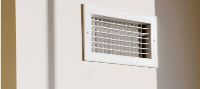 A furnace blowing cold air through open air vents