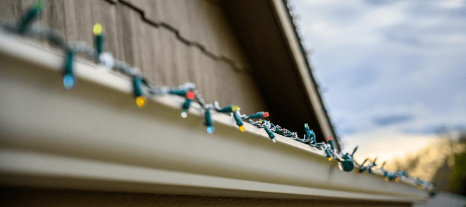 A string of LED Christmas lights that are dim