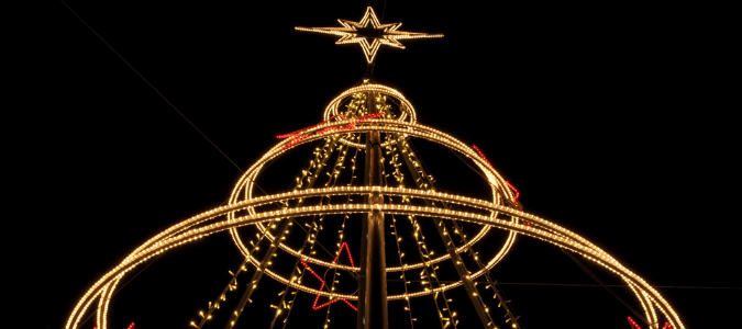 a lit up Christmas tree in College Station