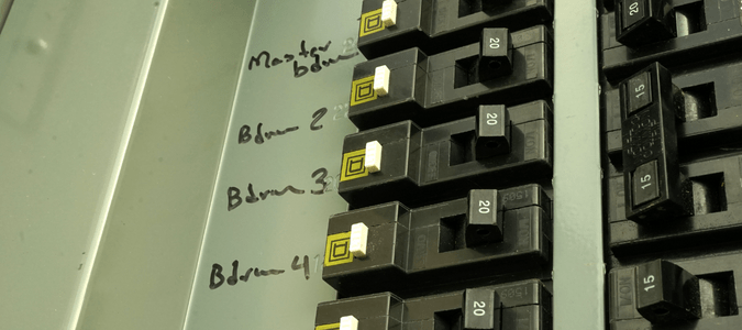 Open breaker box with switches