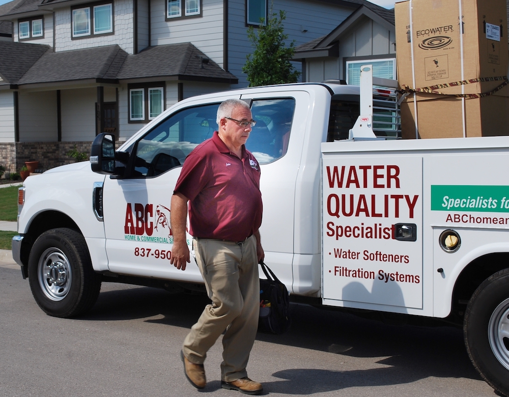 A water quality specialist and an ABC truck