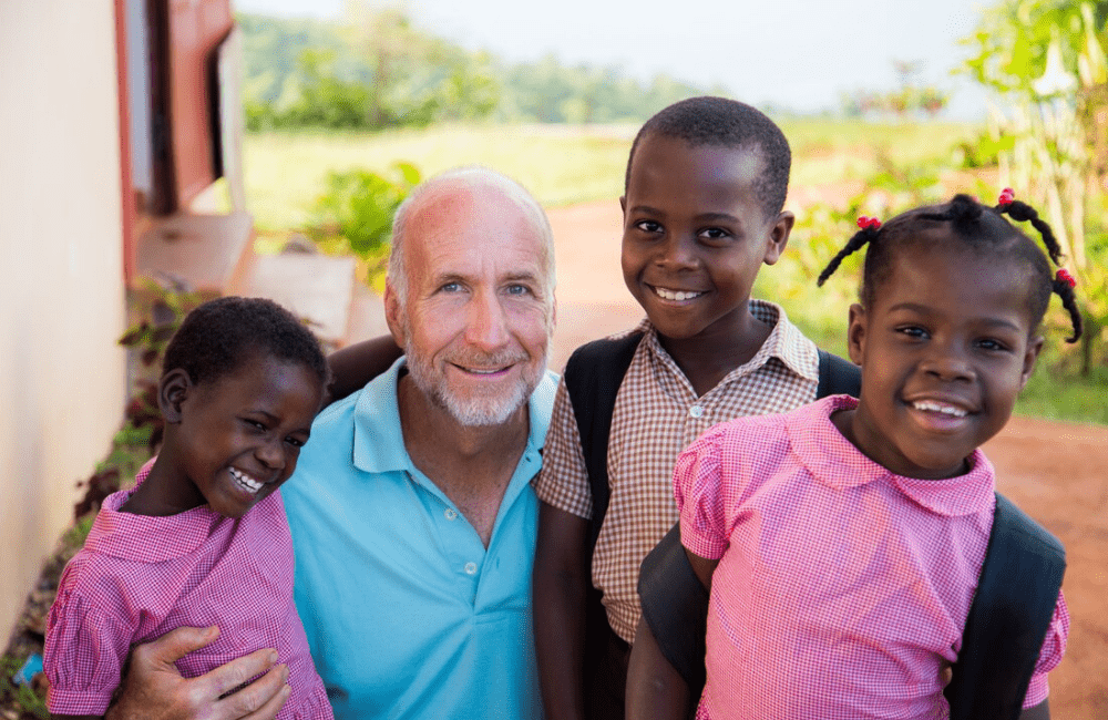 Raleigh Jenkins with children from the Child’s Hope orphanage