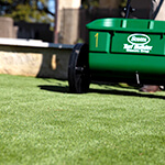 artificial turf being laid in a yard