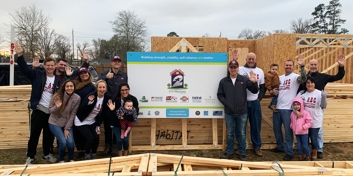 ABC team members volunteering for Habitat for Humanity