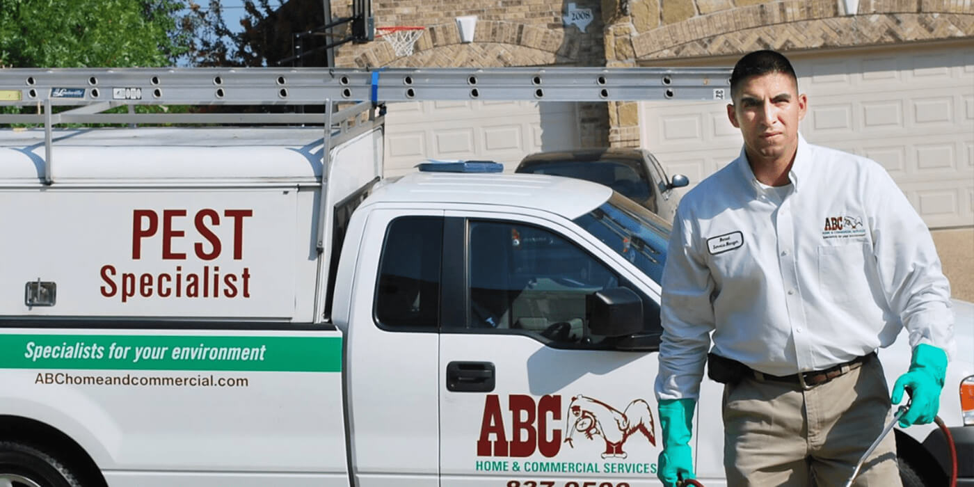 an ABC pest control specialist arriving at a home for treatment
