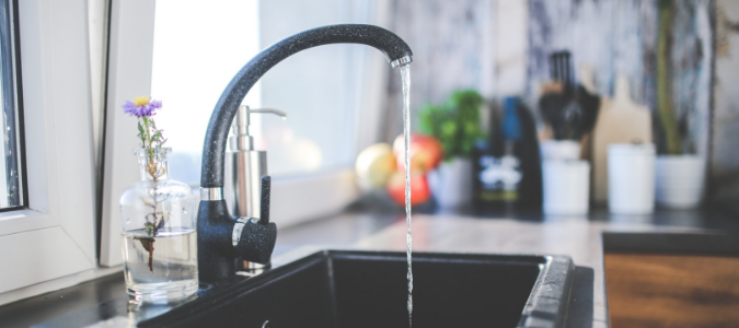 hot water coming out of a sink faucet