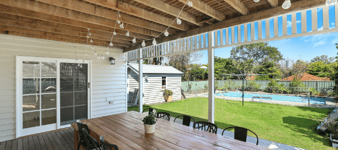 a backyard with a deck