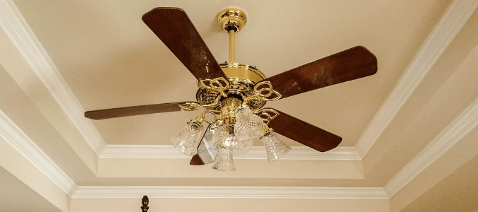 a wooden ceiling fan with LED bulbs