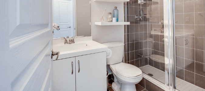 a bathroom where the toilet makes a loud thud after flushing
