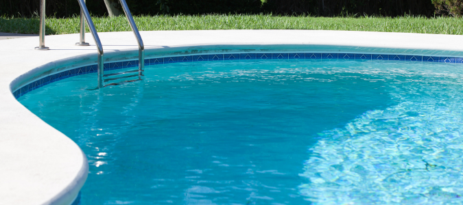 a home pool and lawn