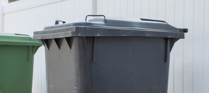 a closed trash bin