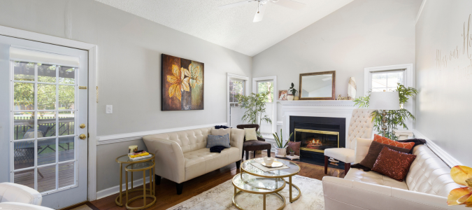 sofas, a chair, and a fireplace in a home's living area