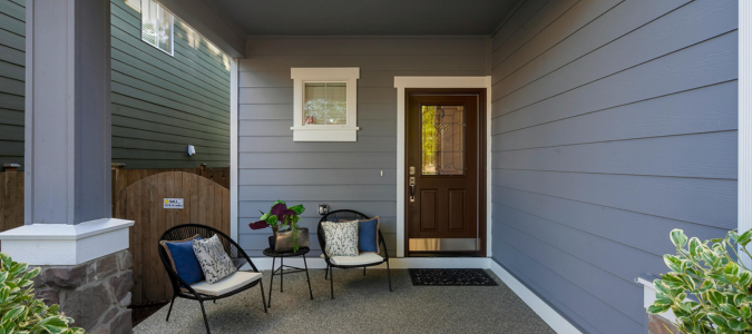 Blue house exterior with covered porch