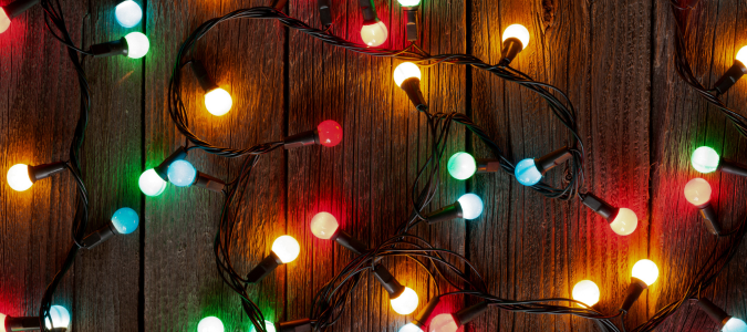Christmas string lights on wood