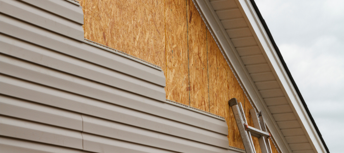 Installing siding on a house