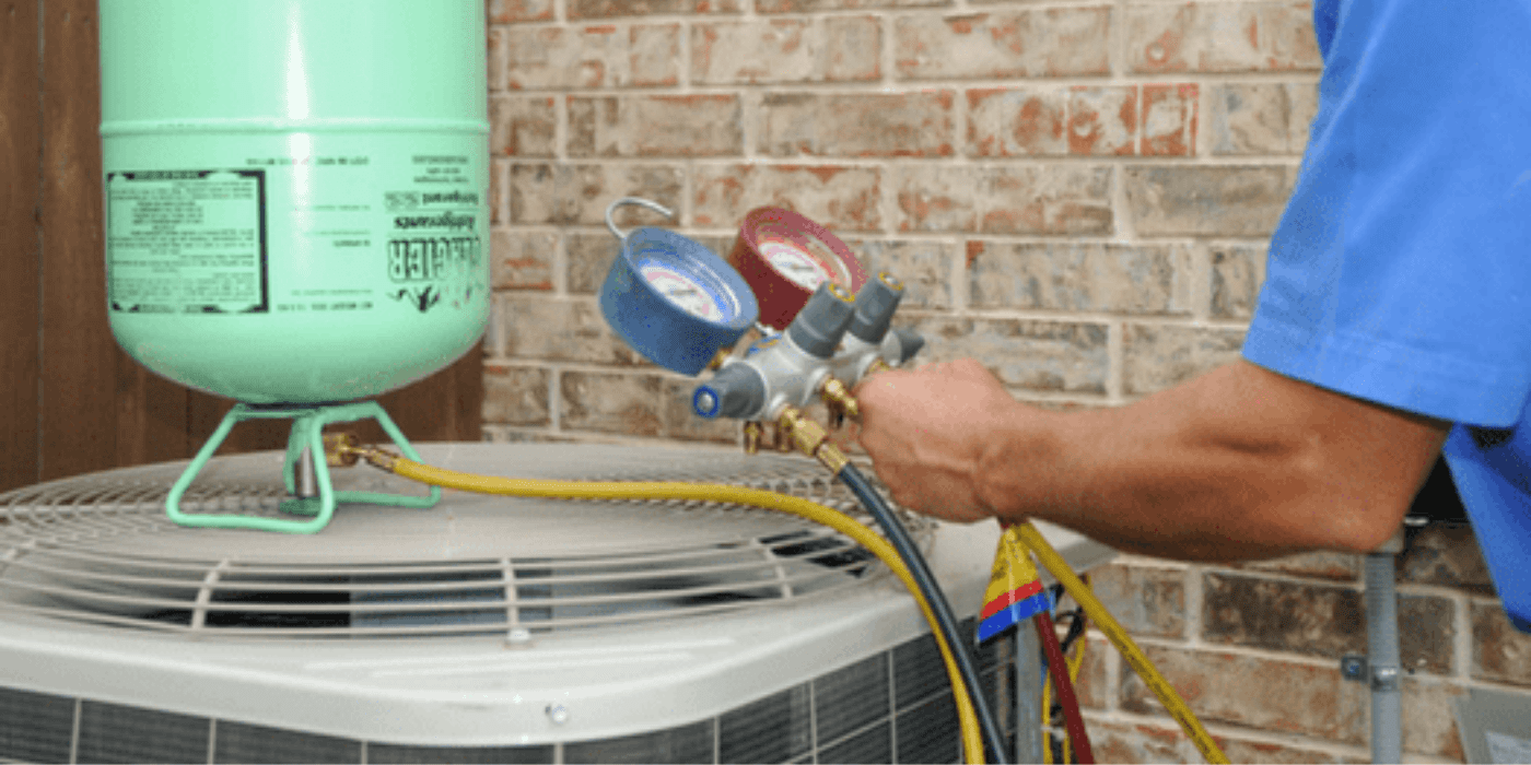 a licensed heating and cooling specialist diagnosing an air conditioning problem
