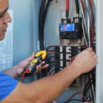 a specialist upgrading a homeowner’s electrical panel
