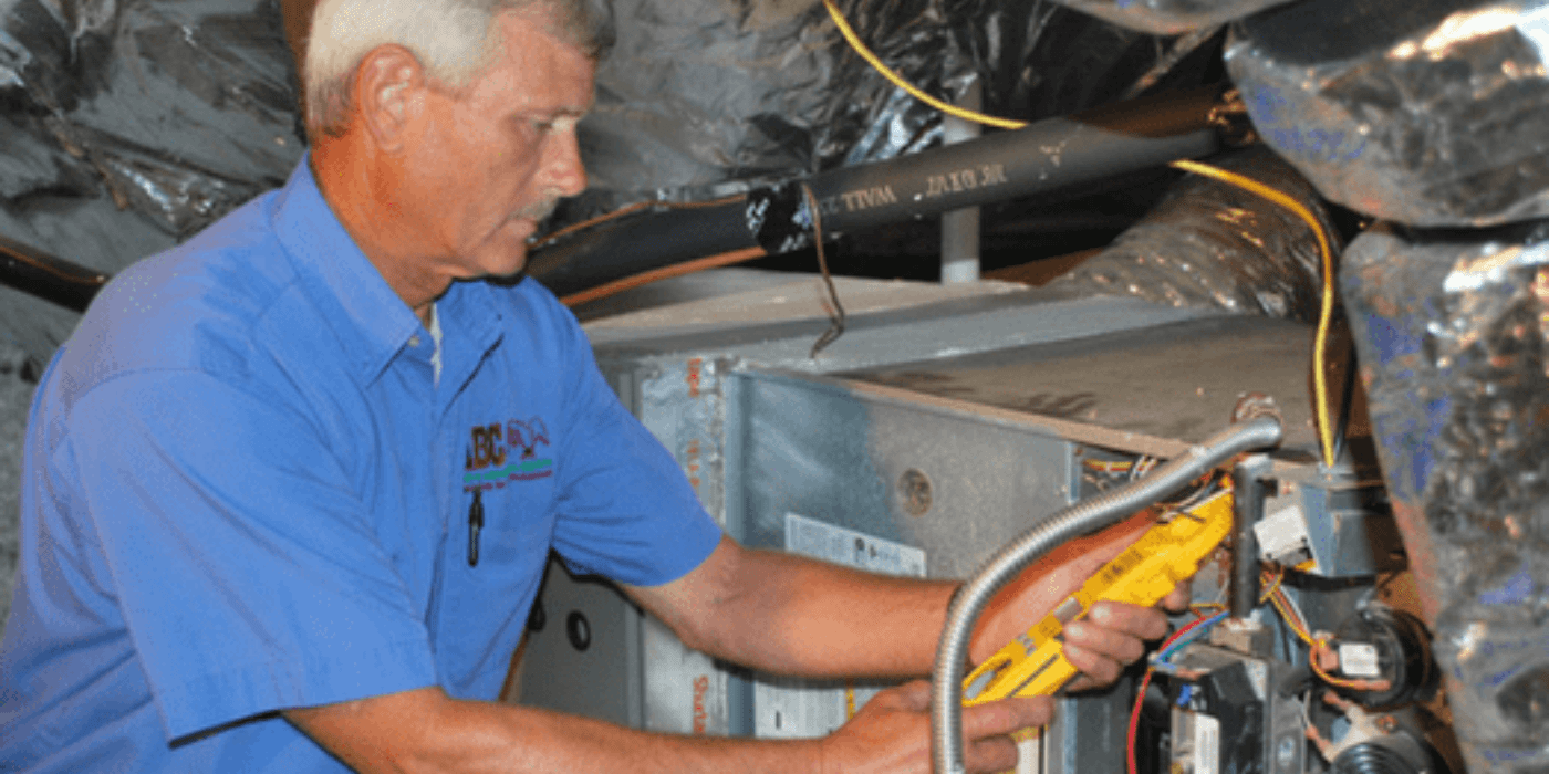an HVAC specialist writing a report on a homeowner’s heating and cooling system