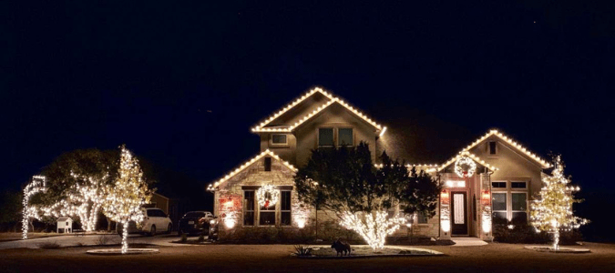 a house that hired ABC to hang up their Christmas Lights