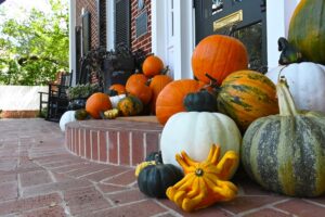 decorative pumpkins on a front porch