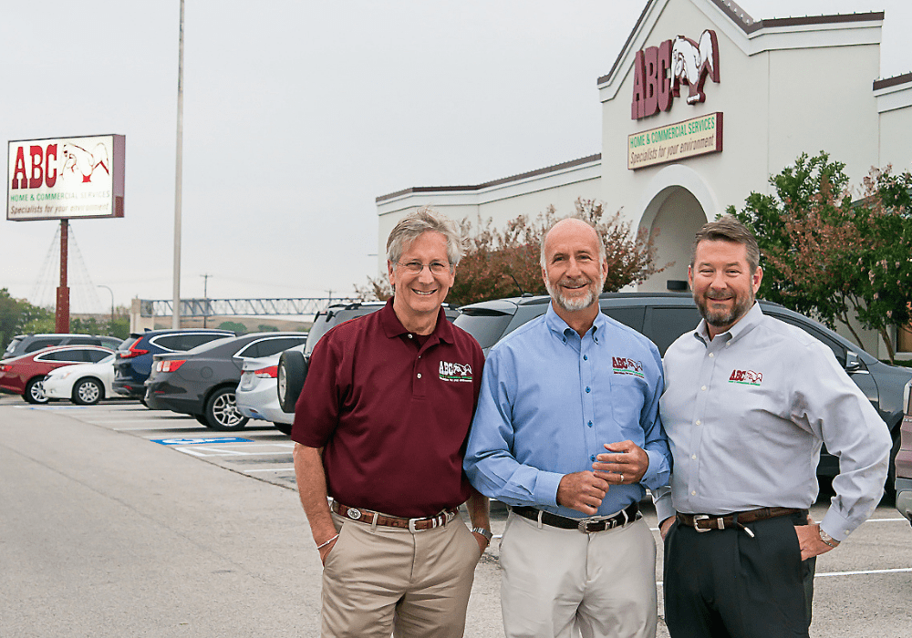 Bobby Jenkins, Raleigh Jenkins and Dennis Jenkins standing outside of an ABC office