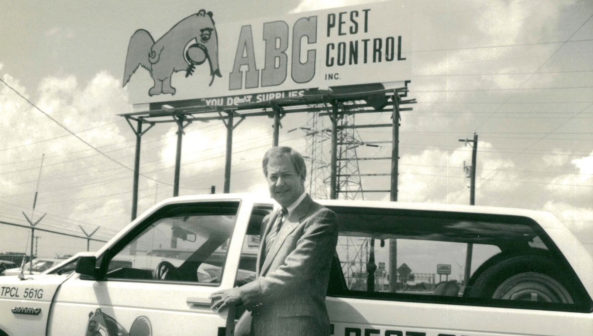 Bob Jenkins Sr. standing in front of an ABC billboard