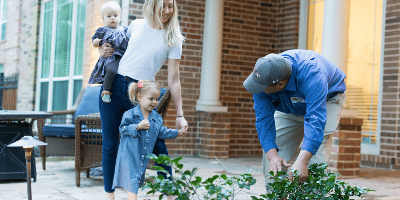 an ABC specialist speaking with a customer and her children