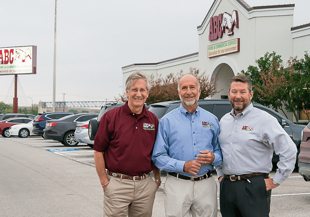 Bobby Jenkins, Raleigh Jenkins and Dennis Jenkins standing outside of an ABC office