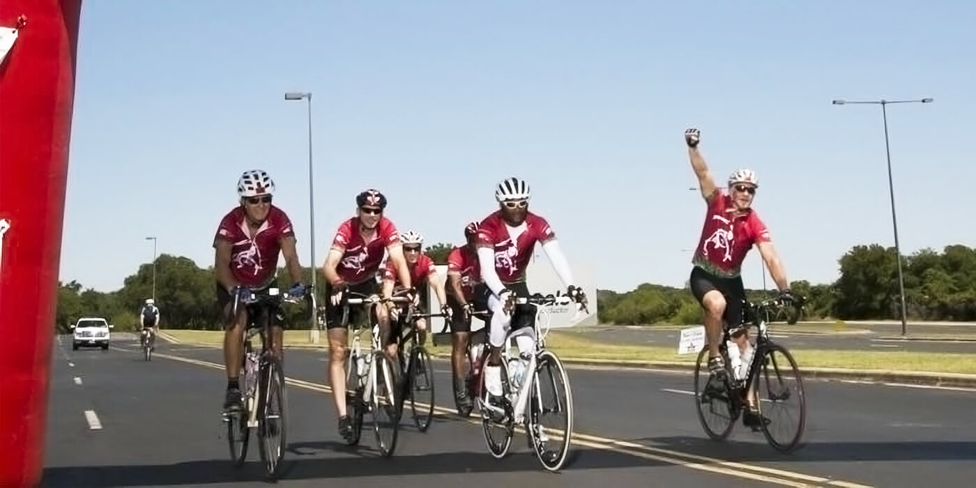 the three Jenkins brother triumphantly biking cross country for charity